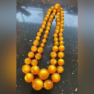 Elegant 1950’s yellow cat’s eye beaded double strand necklace